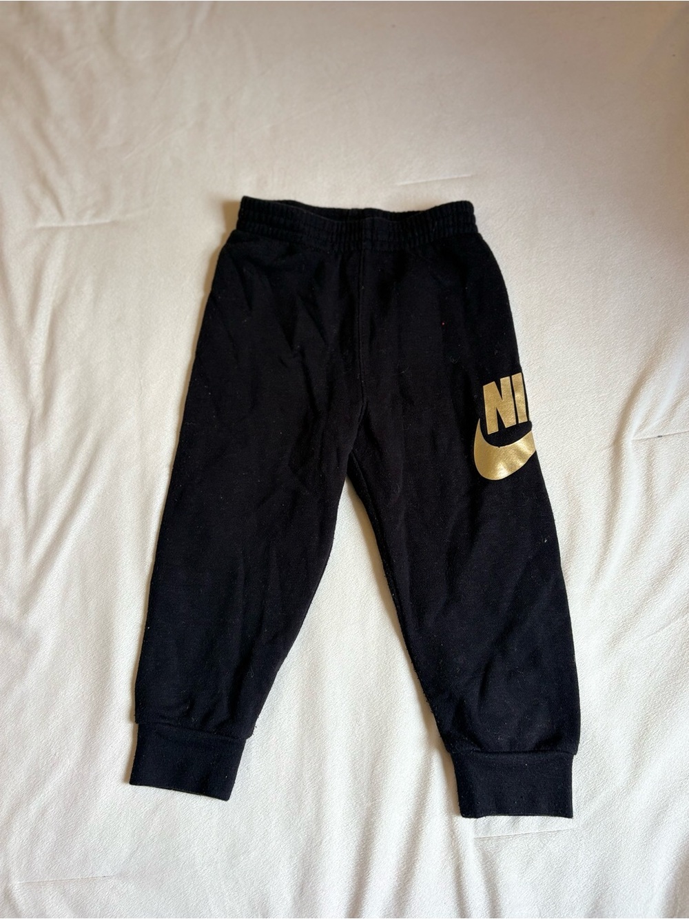 Nike Black Sweat Joggers with Gold Swoosh
